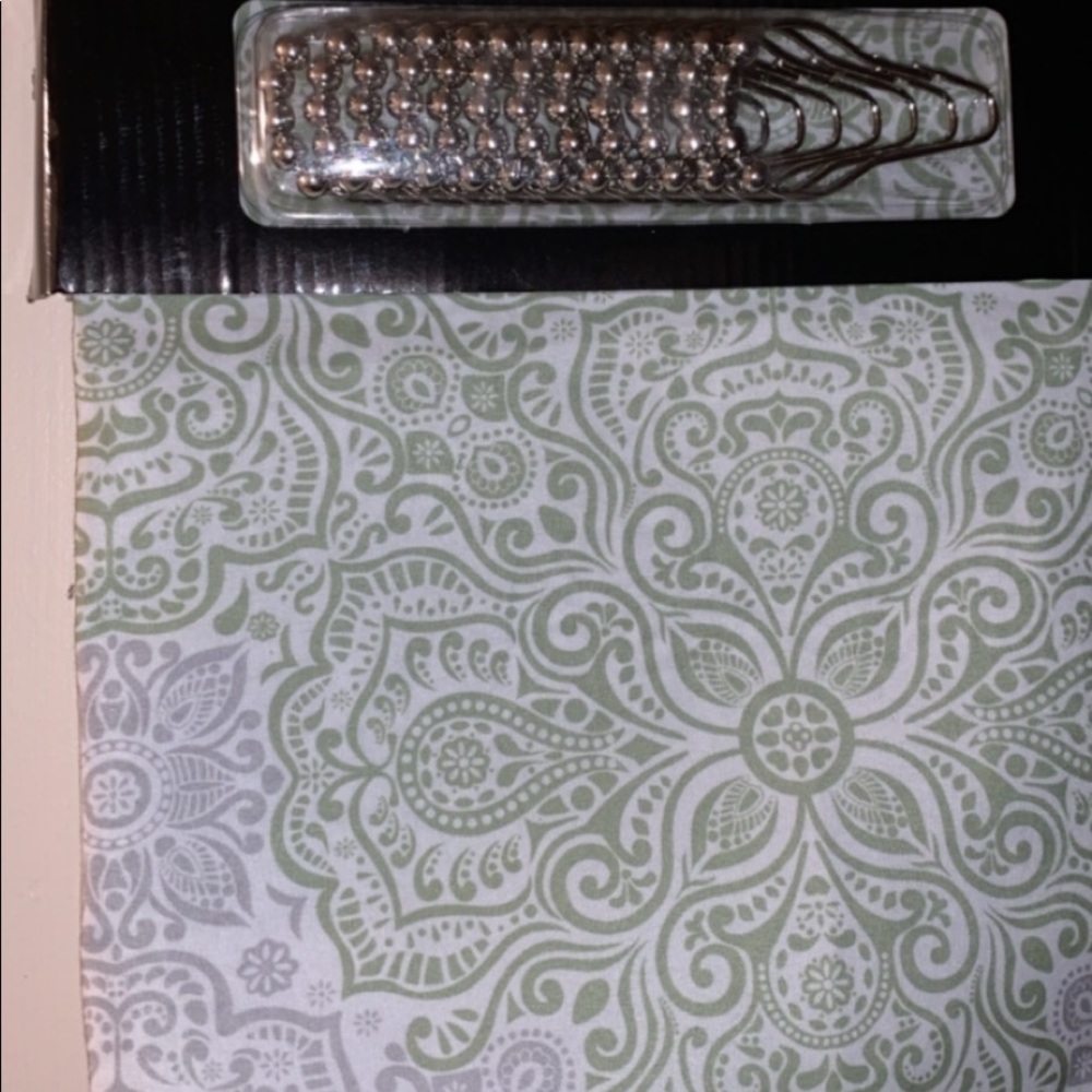 Shower curtain with 12 beaded hooks